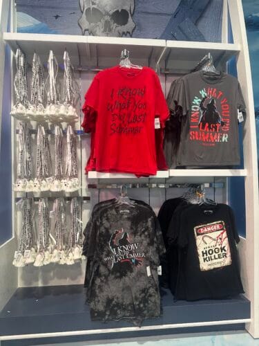 Red, gray, and black I Know What You Did Last Summer shirts, including a Hook Killer warning design.